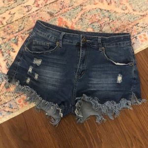 Distressed blue denim shorts, medium